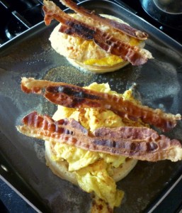 Cooking 'em up. Bacon's a tad overdone, oh well.