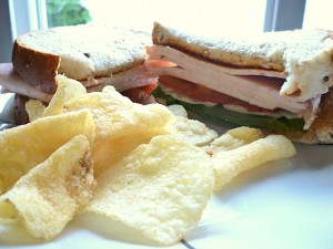 Smoked Turkey Sandwich with Paprika Mayonnaise and a side of Salt & Vinegar Chips