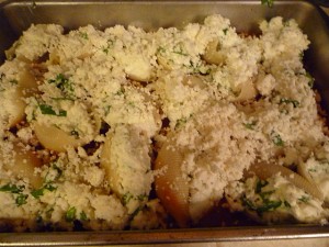 Prepped Spinach and Ricotta Stuffed Shells topped with grated mozzarella cheese