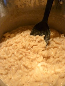 Stirring in the noodles, almost ready!